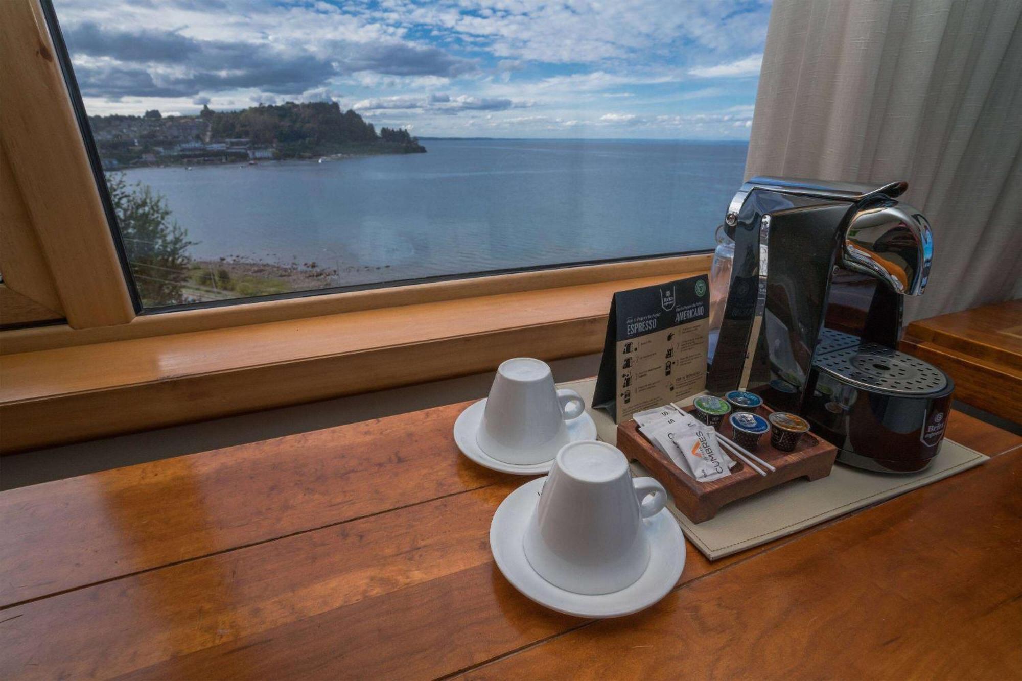 Wyndham Puerto Varas Pettra Екстериор снимка A Nespresso coffee machine in a hotel room